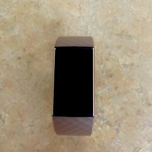 Fitbit Charge 3 with additional coloured bands. Excellent condition.